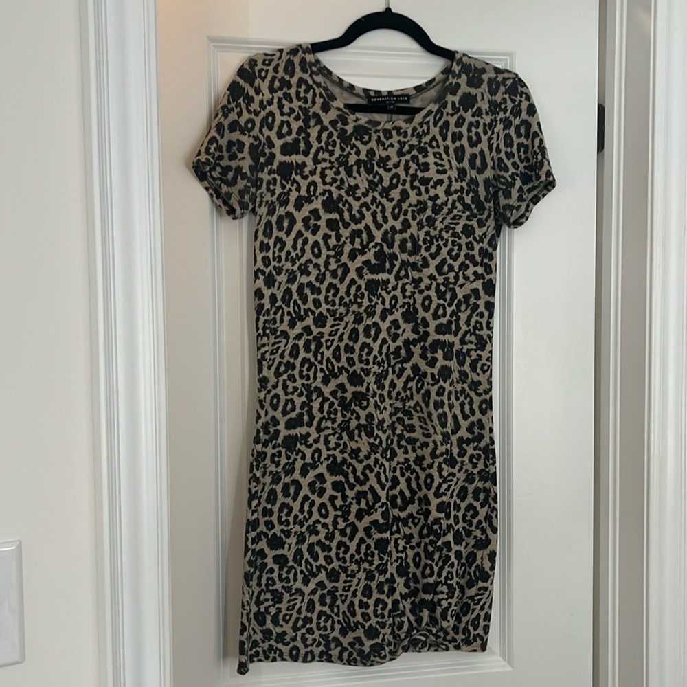 Leopard cotton dress with pocket and knot detail at bottom